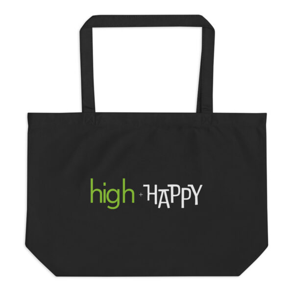 Large black organic tote bag, green and white text on one side says high + happy in regular arial like font