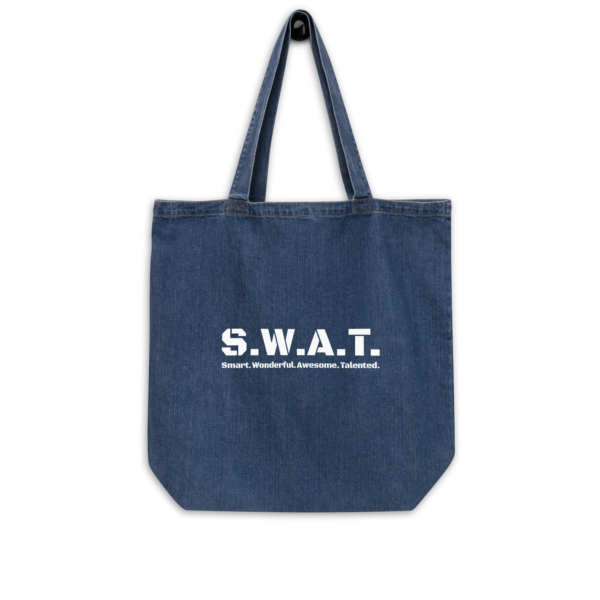 Organic denim tote bag, swat written out phonetically with smart wonderful awesome talented written out dictionary style underneath