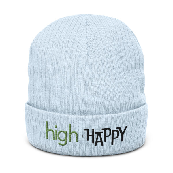 Light blue ribbed knit beanie, green and black text on one side says high + happy in regular arial like font