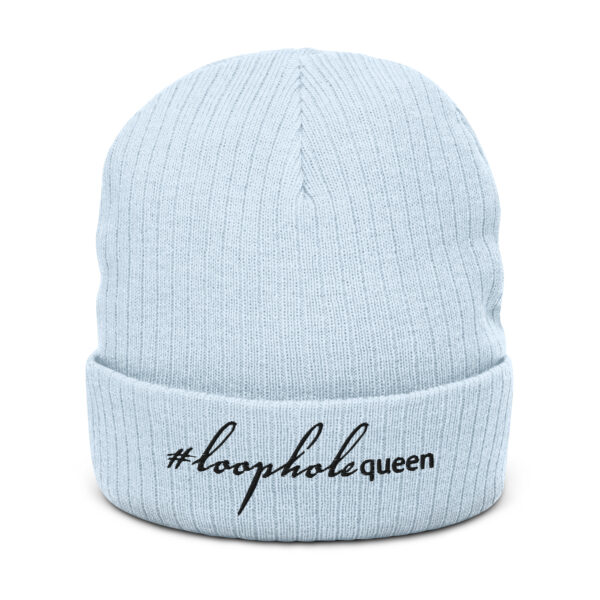 Light blue ribbed knit beanie, black text on one side says hashtag loophole queen written in italic cursive like font