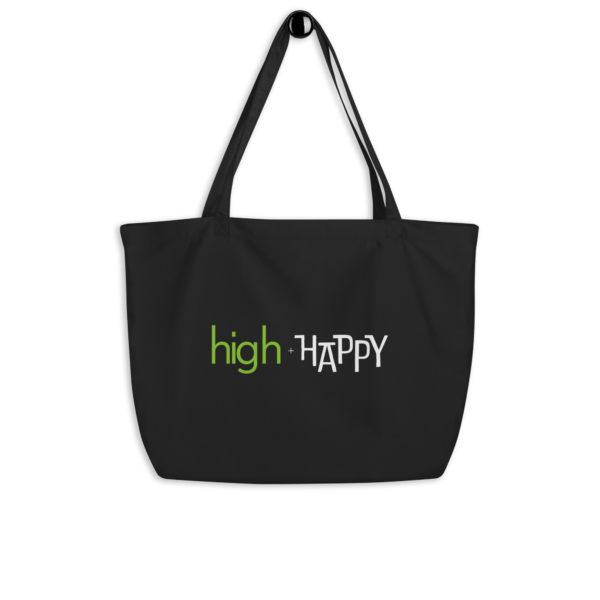 Large black organic tote bag, green and white text on one side says high + happy in regular arial like font