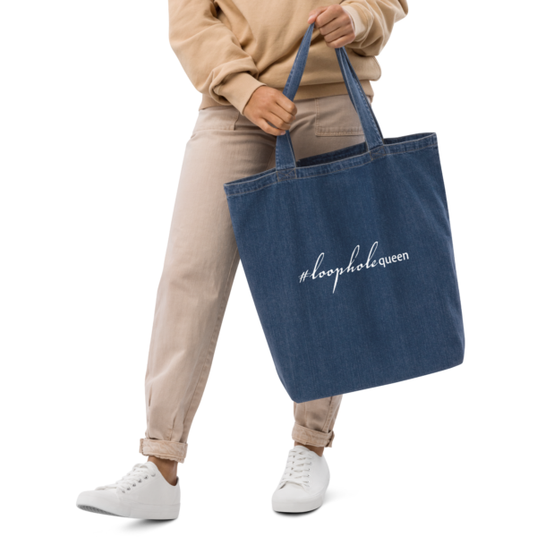 Organic denim tote bag, hashtag loophole queen written out in cursive like font and regular arial like font