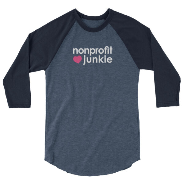 Navy 3 4th sleeve raglan shirt, heather denim in middle, white text on one side says nonprofit junkie next to a pink heart