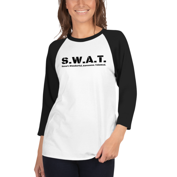 Black 3 4th sleeve raglan shirt, white in middle, black text on one side says swat written out phonetically with smart wonderful awesome talented written out dictionary style underneath, on a woman