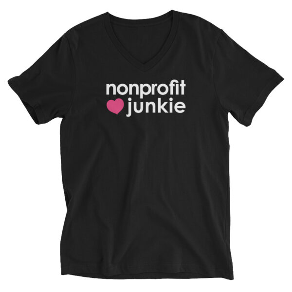 Unisex black v neck t shirt, white text on one side says nonprofit junkie in regular arial font next to a pink heart