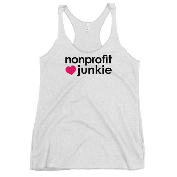 Womens heather white racerback tank, black text on one side says nonprofit junkie next to a pink heart