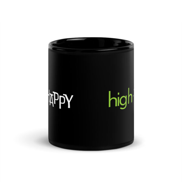 Black glossy 11 ounce mug front view, white and green text around side says high + happy in regular arial like font and all capitalized arial like font