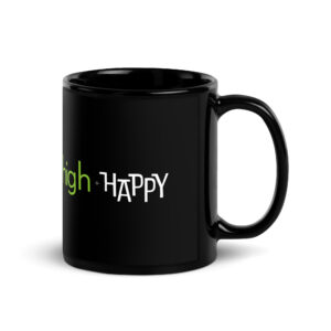 Black glossy 11 ounce mug handle on right side, white and green text around side says high + happy in regular arial like font and all capitalized arial like font