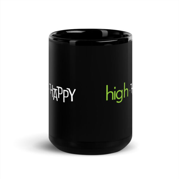 Black glossy 15 ounce mug front view, white and green text around side says high + happy in regular arial like font and all capitalized arial like font