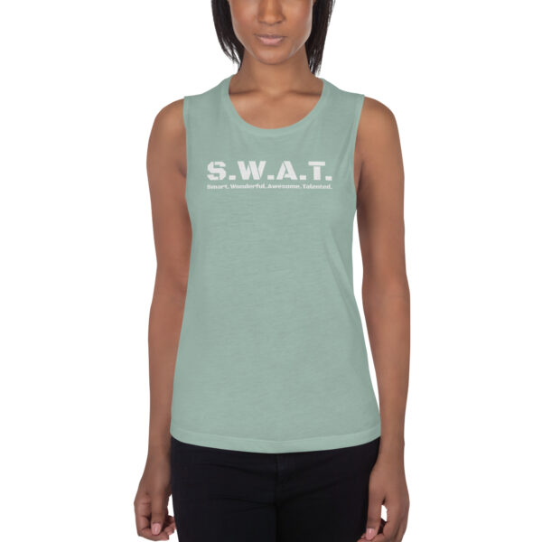 Womens dusty blue muscle tank, white text on one side says swat written out phonetically with smart wonderful awesome talented written out dictionary style underneath, on a woman