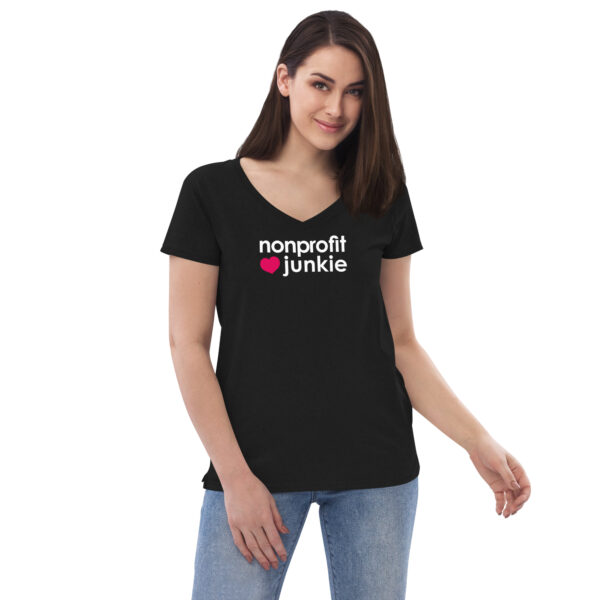 Womens black v neck t shirt, white text on one side says nonprofit junkie in regular arial font next to a pink heart