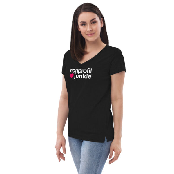 Womens black v neck t shirt, white text on one side says nonprofit junkie in regular arial font next to a pink heart