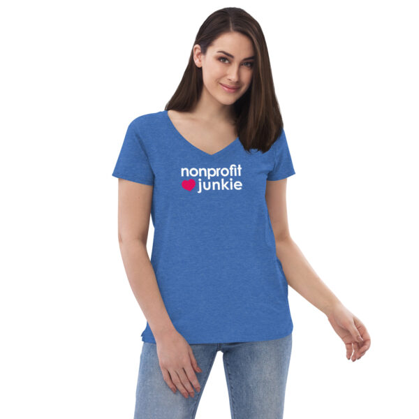 Womens heather blue v neck t shirt, white text on one side says nonprofit junkie in regular arial font next to a pink heart