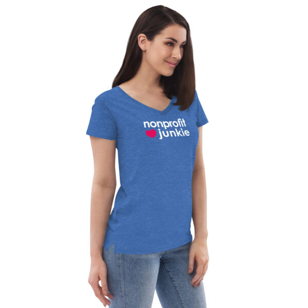 Womens heather blue v neck t shirt, white text on one side says nonprofit junkie in regular arial font next to a pink heart