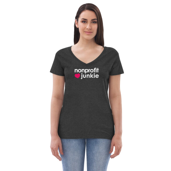 Womens charcoal heather v neck t shirt, white text on one side says nonprofit junkie in regular arial font next to a pink heart