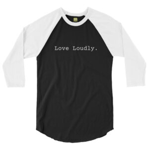 Unisex white 3 4th sleeve raglan shirt with black in middle, white text on one side says love loudly in regular arial like font